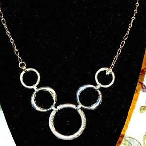 Textured Silvertone Infiniti Ring Necklace w  Cirle/Bar Closure.